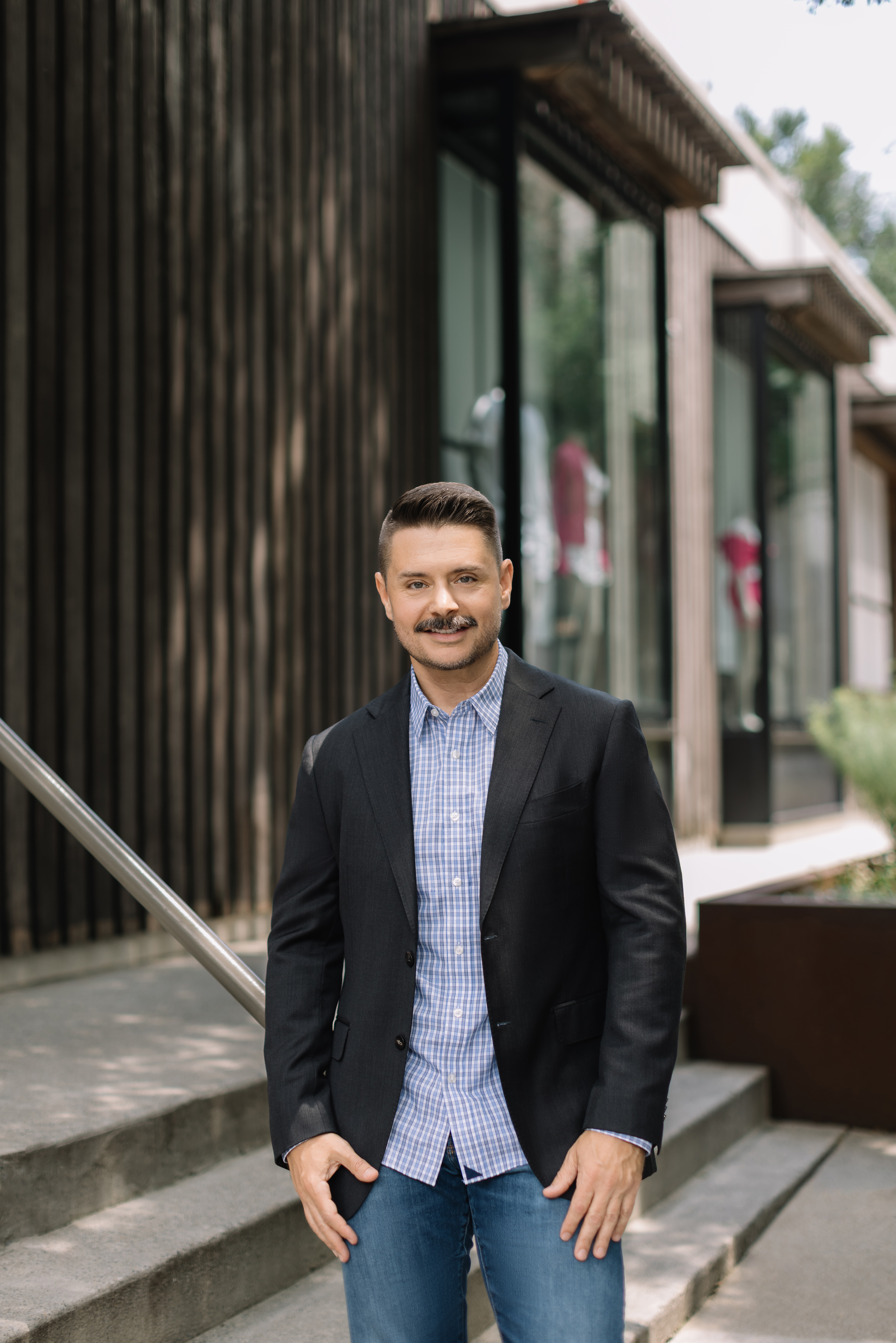 Michael Harn standing outside a contemporary building