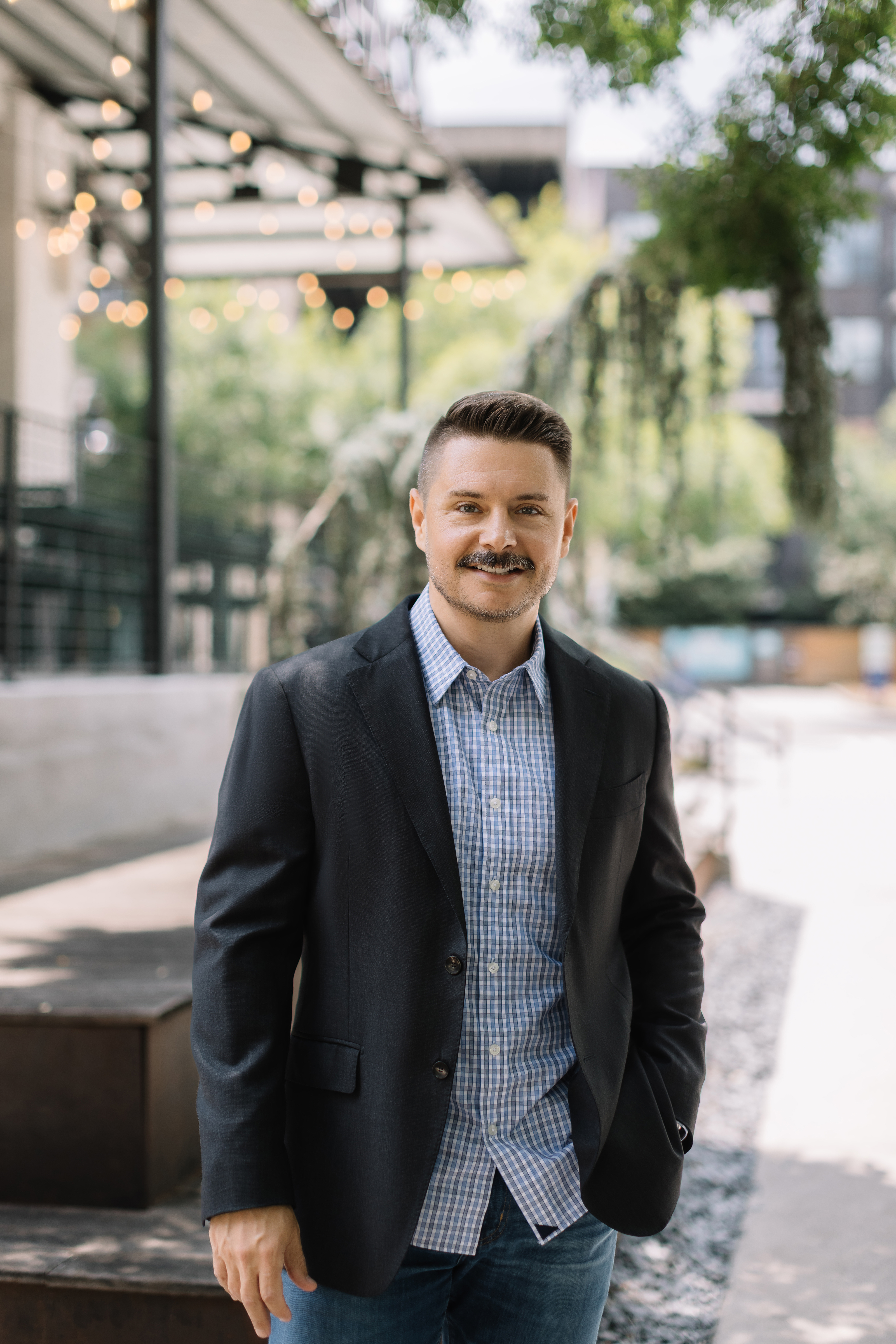 Michael Harn outdoors in a dark blazer
